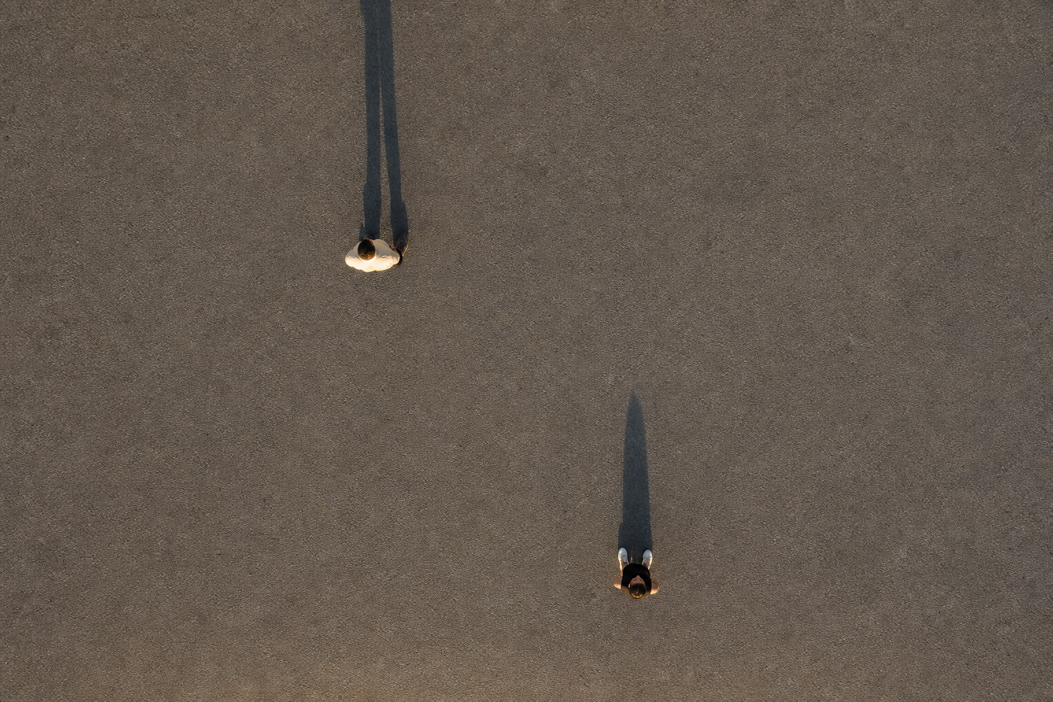 Two People, Long Shadows (Overhead)